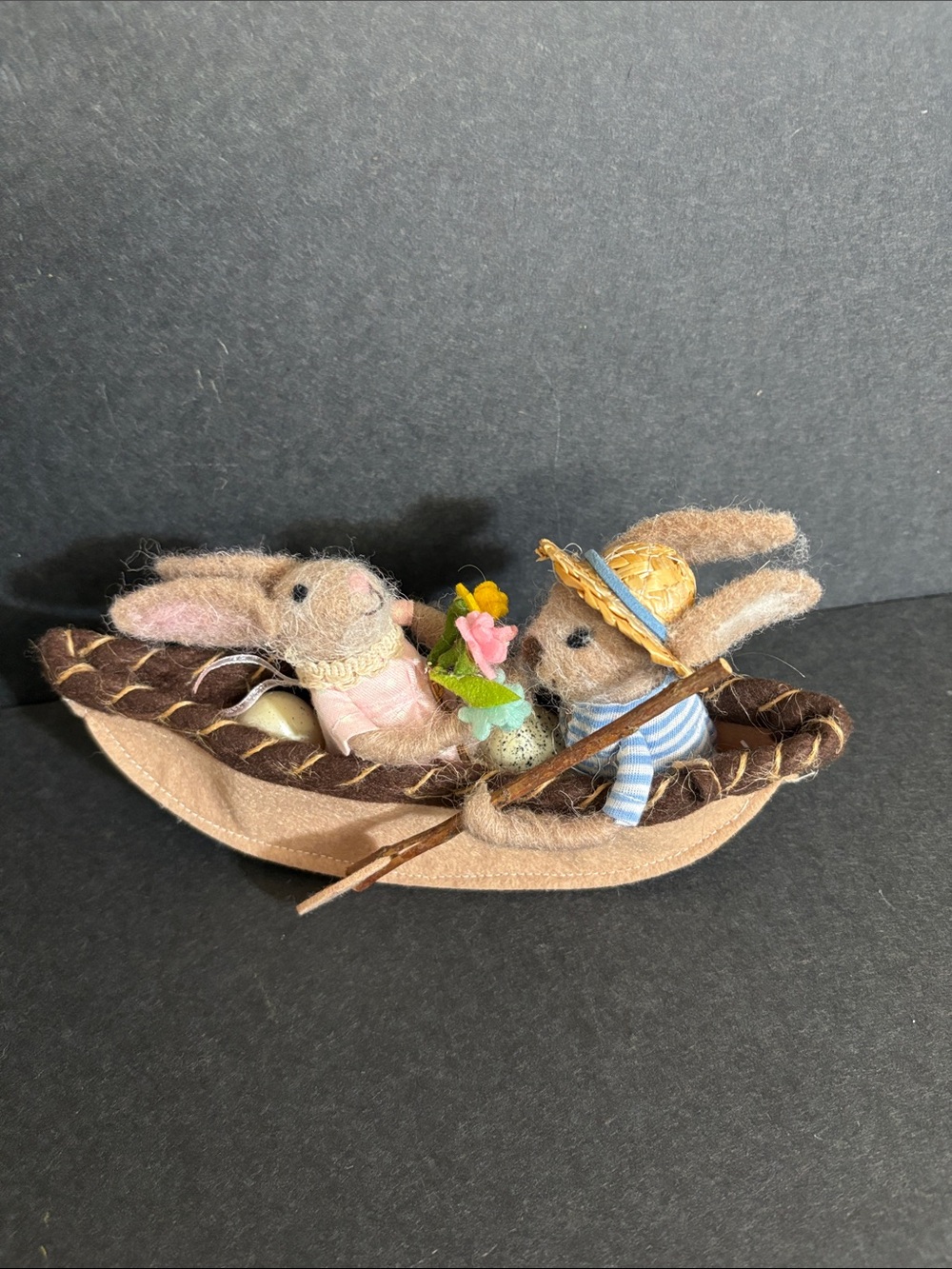 Easter figurine bunny couple rowing a boat